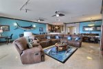 Livingroom with leather seating and large flatscreen T